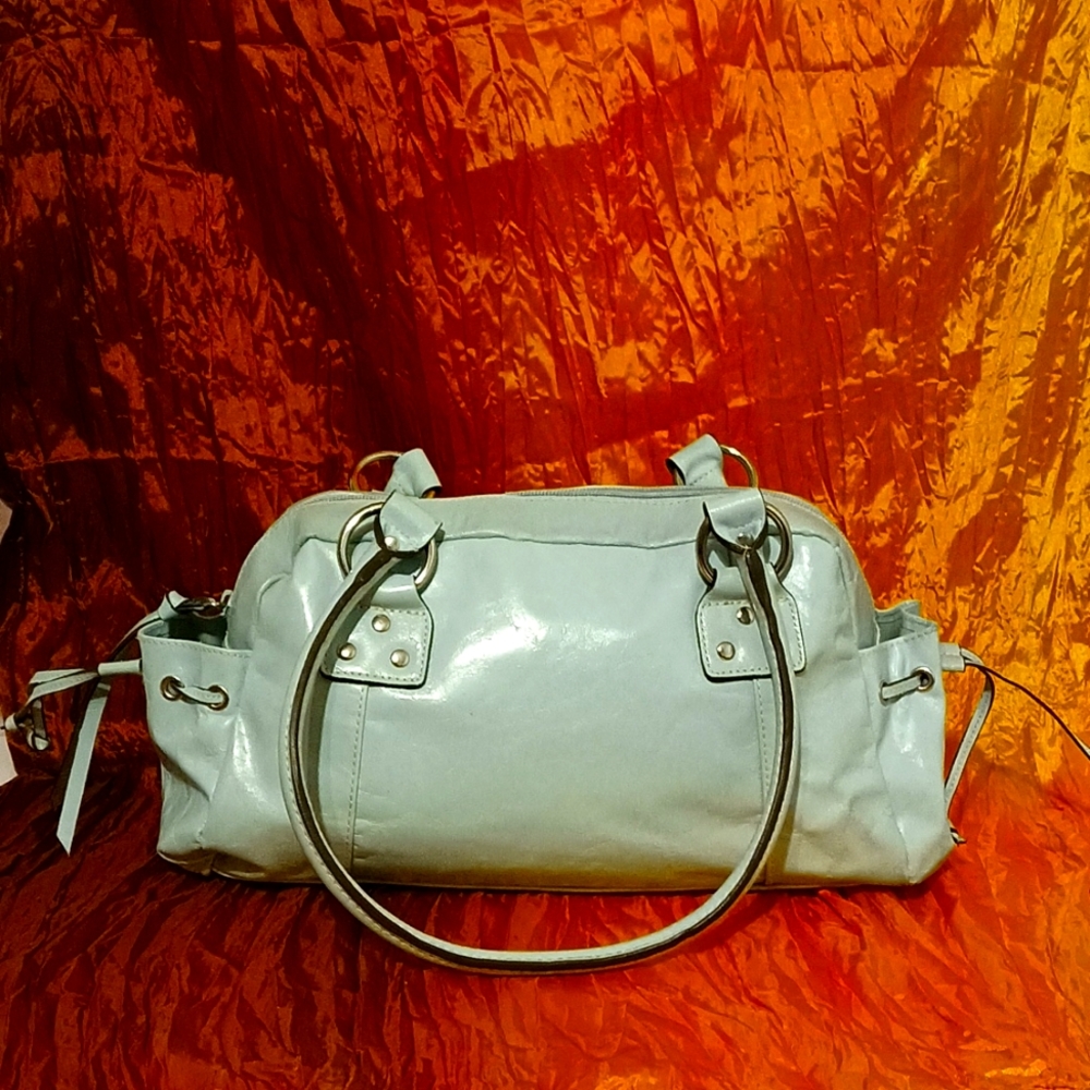 Seafoam green saddle purse